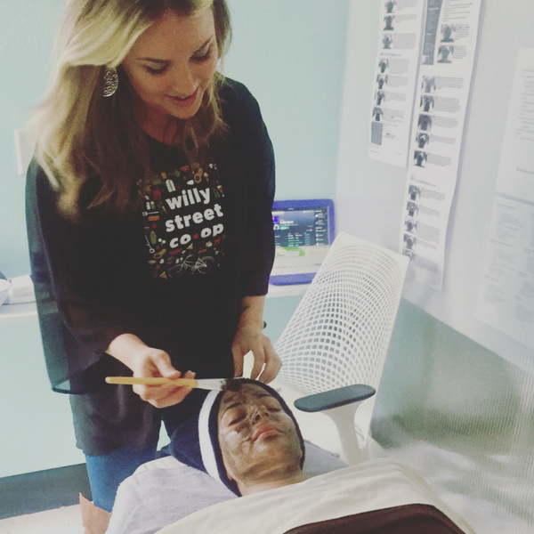 esthetics student performing facial