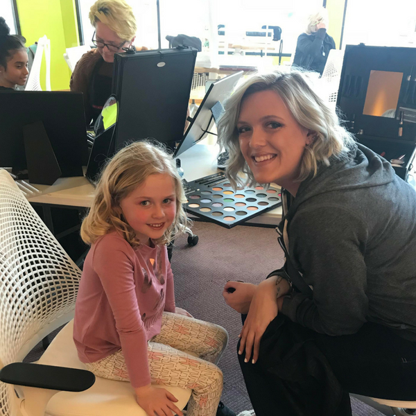 student with client for birthday party makeover