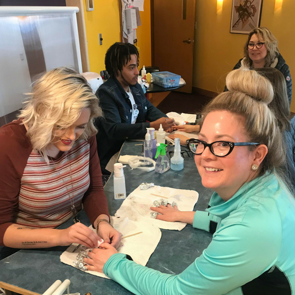 students practicing manicures