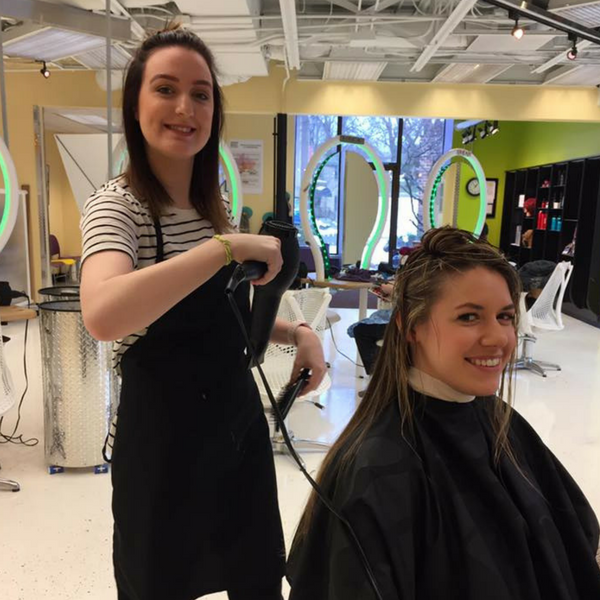 student drying hair