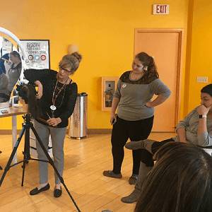 Instructor Karen Teaching Haircuts