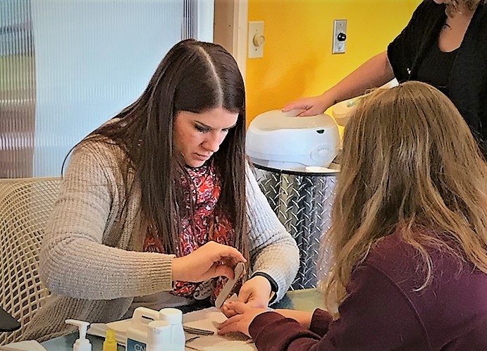 Miss Laura Teaching Manicures