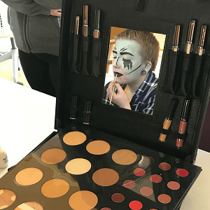 Student Applying Pop Art Makeup student applying makeup